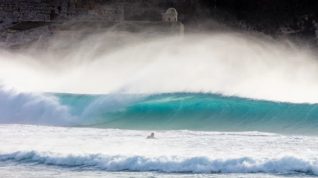 Turquoise wave for surfing on the coast near Tarifa
